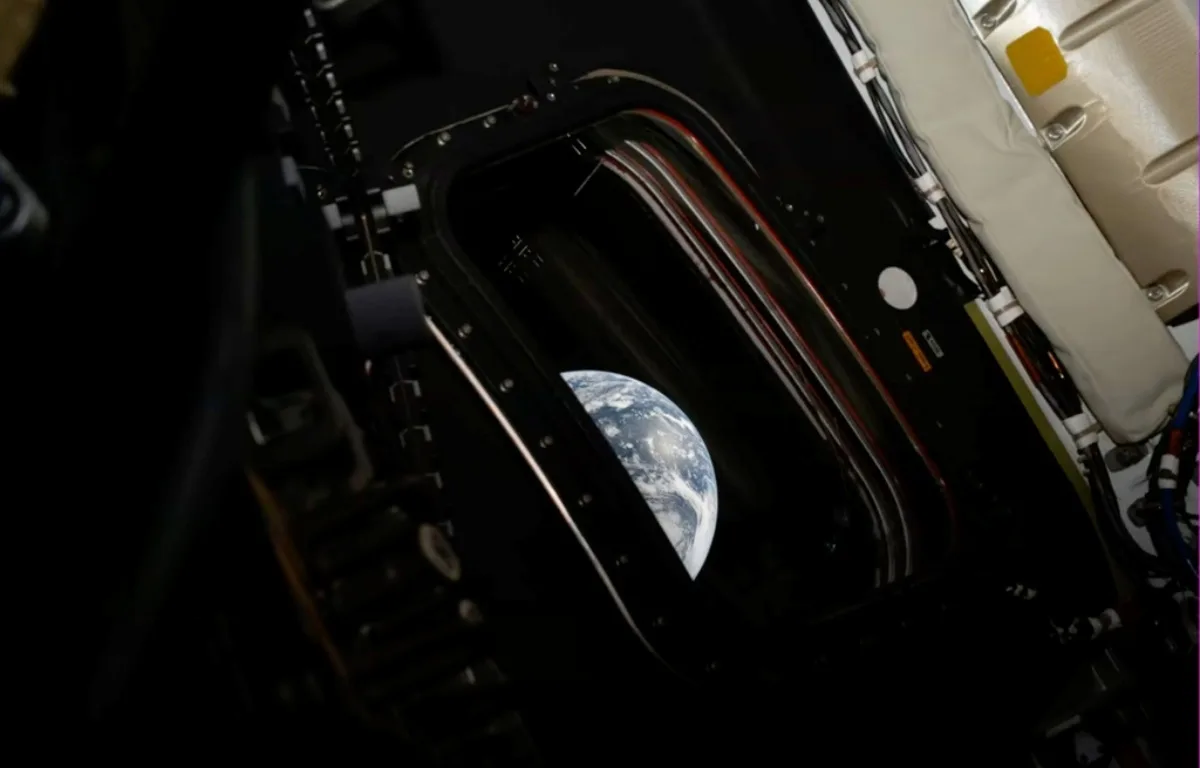 This image provided by NASA shows a downlink image of Earth taken by NASA’s Artemis II astronaut commander Reid Wiseman inside the Orion capsule on Friday, April 3, 2026.